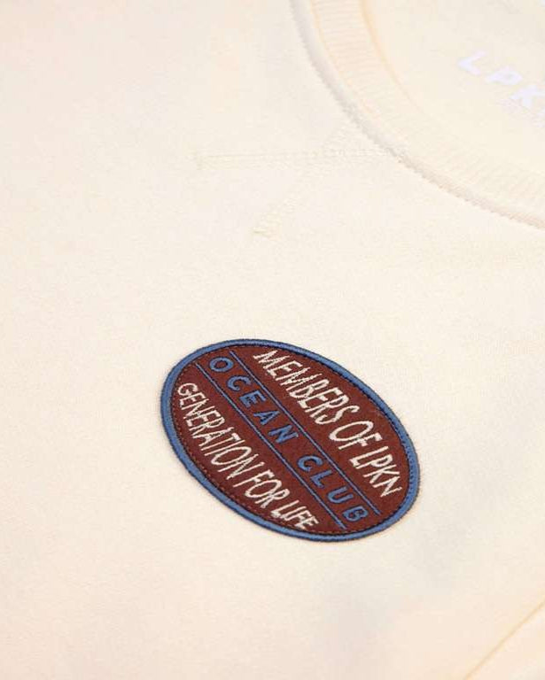 SUDADERA BEIGE PARCHE MoLPKN